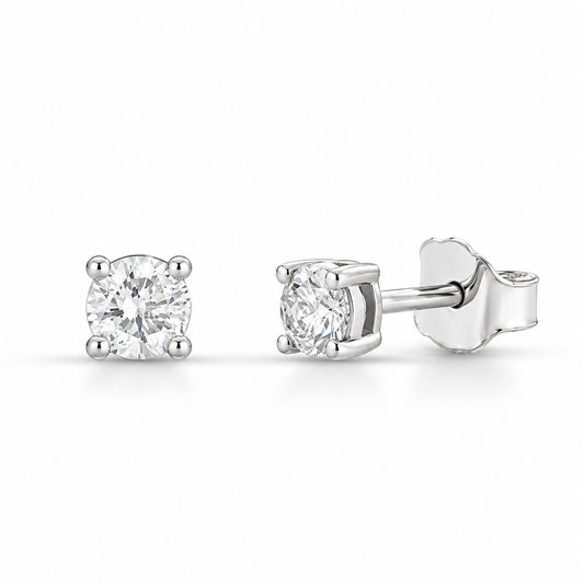 Orecchini punto luce Lucciole in oro bianco 9kt e diamanti 0,10 ct
